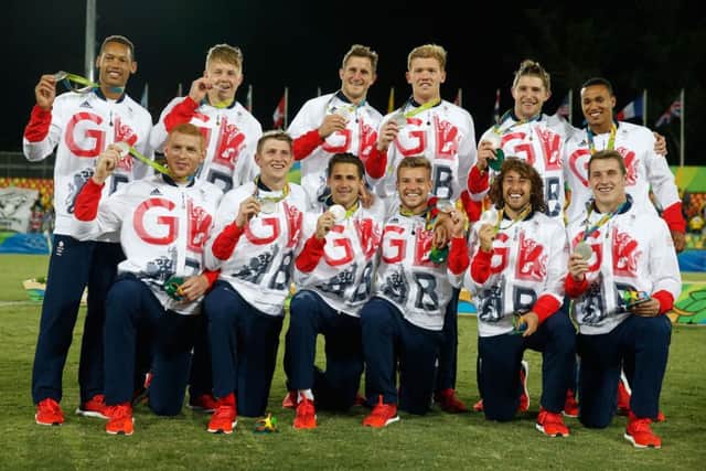 The Great Britain squad show off their silver medals