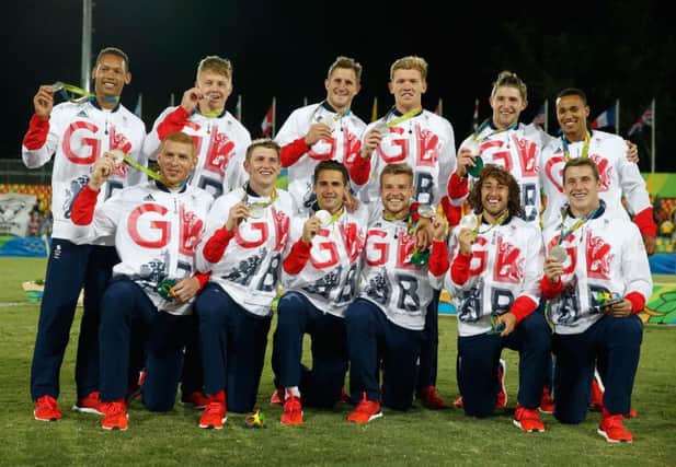 The Great Britain squad show off their silver medals