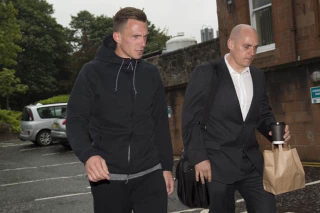 Dorus de Vries (left) arrives for his medical with physio Tim Williamson. Picture: SNS Group