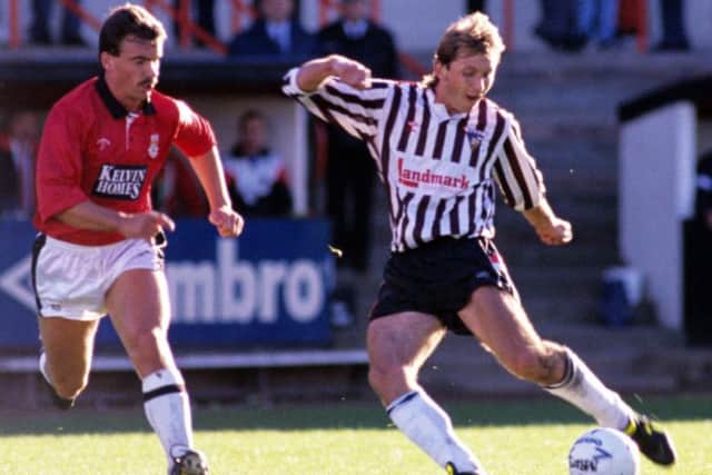 Istvan Kozma (right), watched by St Mirren's Tom Black in October 1989.