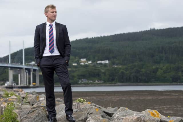Inverness Caledonian Thistle manager Richie Foran outside Caledonian Stadium with the Kessock Bridge and Black Isle in the background. Picture: SNS