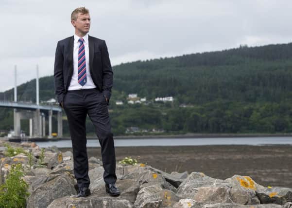 Inverness Caledonian Thistle manager Richie Foran outside Caledonian Stadium with the Kessock Bridge and Black Isle in the background. Picture: SNS