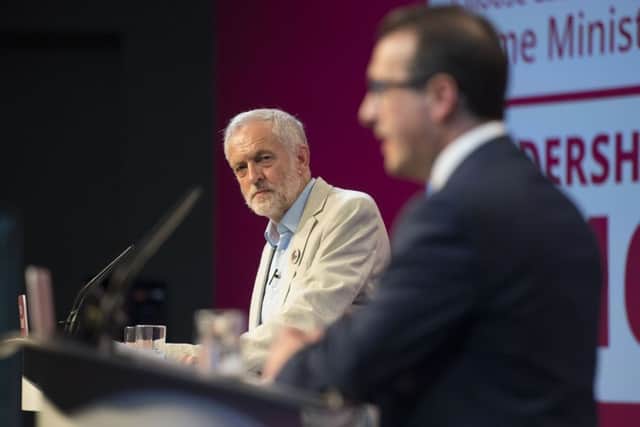 Jeremy Corbyn and Owen Smith during one of the Labour leadership debates. Picture: Getty