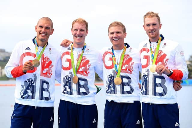 (left to right) Great Britain's Alex Gregory, Mohamed Sbihi, George Nash and Constantine Louloudis celebrating winning the gold medal in the Men's Four Final. Picture: Mike Egerton/PA Wire.