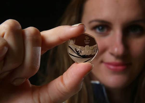 British swimmer Jazz Carlin with the official Team GB gold edition 50p coin. Picture: PA