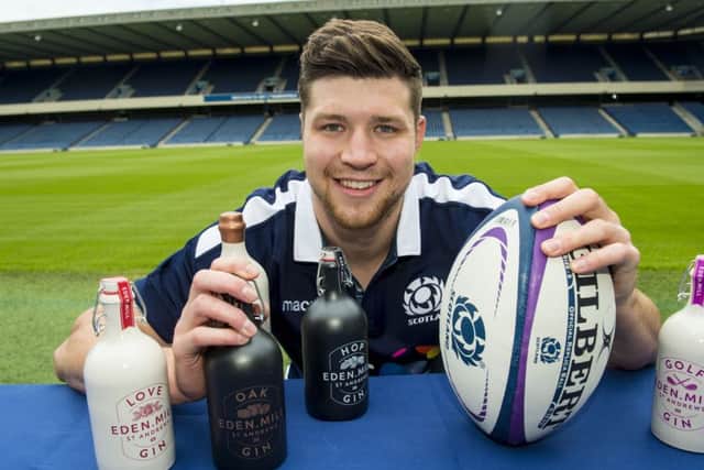 Scotland's Grant Gilchrist helps to promote the rugby team's new sponsorship agreement with Eden Mill Gin
