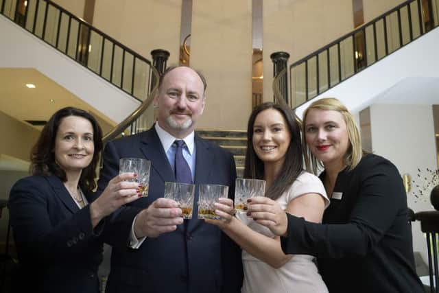 Amaris Hospitality chief executive John Brennan raises a glass for a toast to success in the future. Picture: Sandy Young