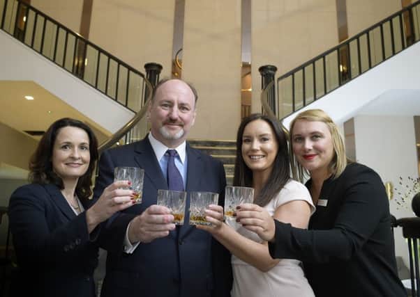 Amaris Hospitality chief executive John Brennan raises a glass for a toast to success in the future. Picture: Sandy Young