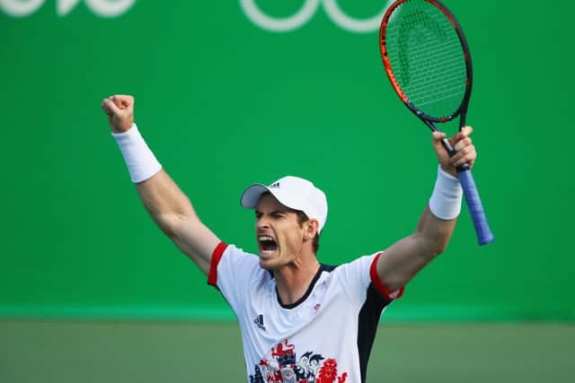 Andy Murray lets out a roar of triumph after defeating Steve Johnson. Picture: Getty.