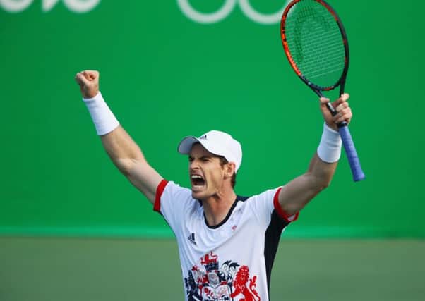 Andy Murray lets out a roar of triumph after defeating Steve Johnson. Picture: Getty.