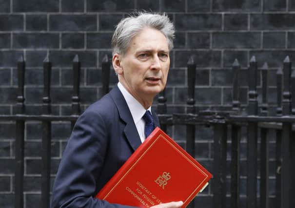 Mr Hammond said the Treasury will plug the post-Brexit funding gap for projects which receive EU structural and investment funds. Picture: AP