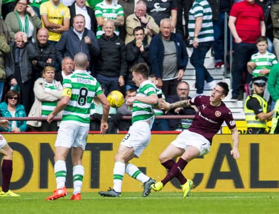 Jamie Walker goes down, a decision he may have cause to regret after facing the SFA on Thursday, below.  Picture: Craig Foy/SNS