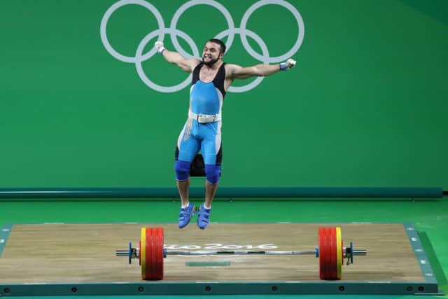 Nijat Rahimovs celebration on lifting gold  and its global viewing  encapsulates the Olympics. Photograph: Julian Finney/Getty