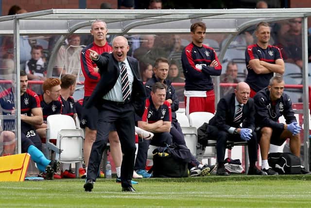 Rangers manager Mark Warburton shouts instructions from the dugout at Dens Park. Picture: Jane Barlow/PA Wire