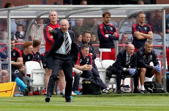 Rangers manager Mark Warburton shouts instructions from the dugout at Dens Park. Picture: Jane Barlow/PA Wire