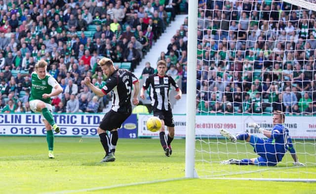 Jason Cummings celebrates the winning goal over Dunfermline at Easter Road. Picture: SNS