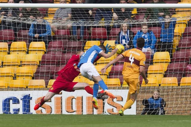 St Johnstone's Steven Maclean (centre) puts St Johnstone 2-1 ahead. Picture: SNS