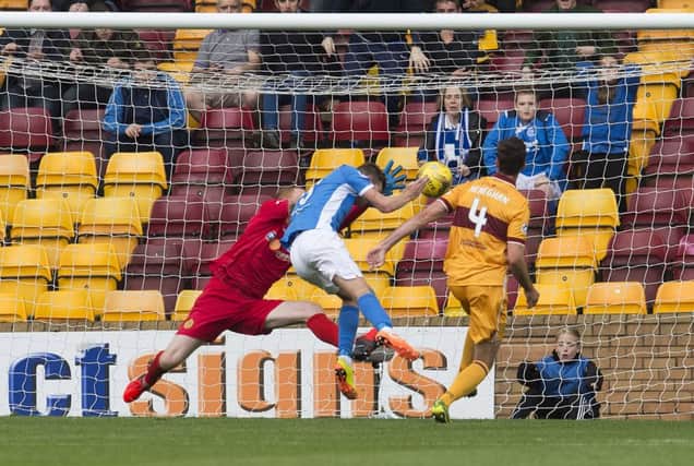 St Johnstone's Steven Maclean (centre) puts St Johnstone 2-1 ahead. Picture: SNS
