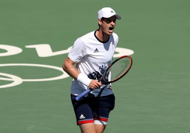 Andy Murray roars during his match against Japan's Kei Nishikori in the Olympic semi-final. Picture: Owen Humphreys/PA Wire