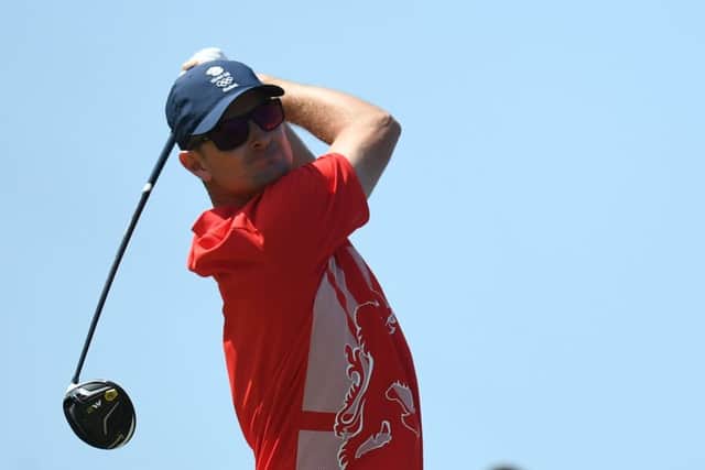 Britain's Justin Rose carded a 65 to lead the Olympic golf tournament. Picture: Jim Watson/AFP/Getty Images