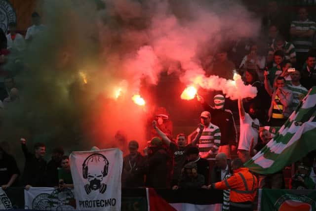 Flares are let off during the Inter v Celtic International Champions Cup match in Limerick. Picture: Niall Carson/PA Wire