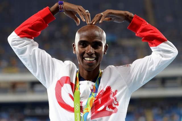 Mo Farah performs his 'Mobot' celebration after winning gold in the 10,000m. PICTURE: AP