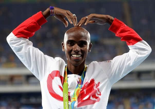 Mo Farah performs his 'Mobot' celebration after winning gold in the 10,000m. PICTURE: AP