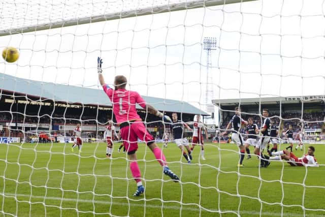 Harry Forrester, right, scores the opening goal for Rangers during their victory over Dundee at Dens Park. Picture: SNS Group