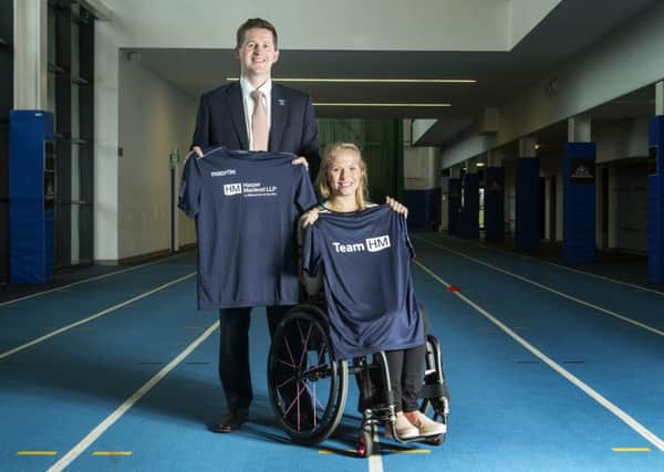 Harper Macleod chief executive Martin Darroch with Paralympian Sammi Kinghorn. Picture: Contributed