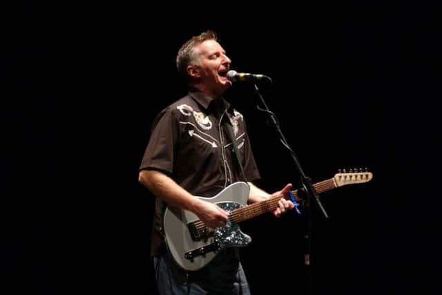 Billy Bragg playing at the Usher Hall.