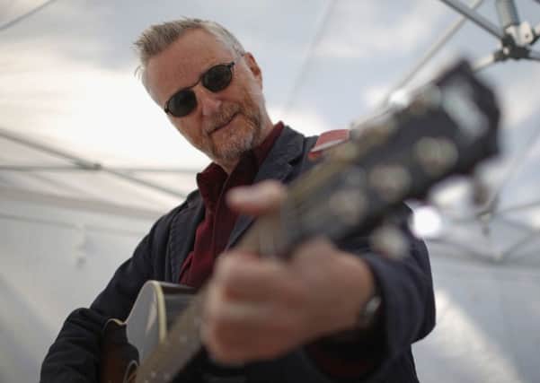 Billy Bragg waits to perform Picture: Getty Images