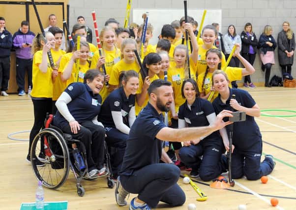 Champions in Scotland event launch at Wallace High In Stirling.  Scott Frew, who has represented GB playing Handball, takes a group shot.