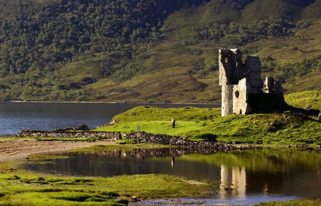 You can take in the ruins of Ardvreck Castle on the NC500. Picture: TSPL