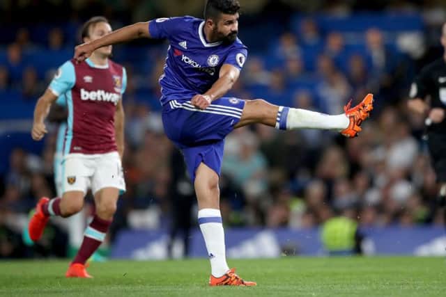 Chelsea's Diego Costa scores his side's second goal of the game during the Premier League match at Stamford Bridge, London. PRESS ASSOCIATION Photo. Picture date: Monday August 15 2016. See PA story SOCCER Chelsea. Photo credit should read: Nick Potts/PA Wire. RESTRICTIONS: EDITORIAL USE ONLY No use with unauthorised audio, video, data, fixture lists, club/league logos or "live" services. Online in-match use limited to 75 images, no video emulation. No use in betting, games or single club/league/player publications.