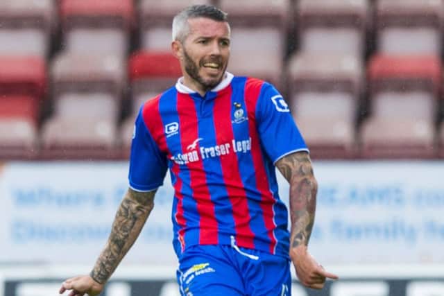 The veteran injured his Achilles in the match against Ross County. Picture: SNS