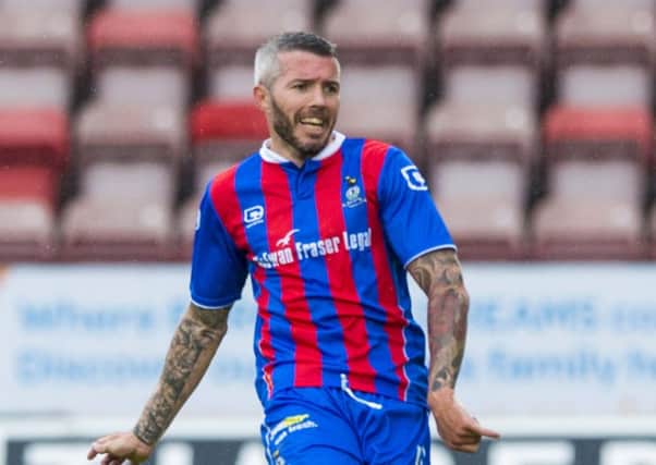 The veteran injured his Achilles in the match against Ross County. Picture: SNS