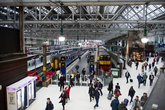 Off-peak ScotRail travellers, like those at Glasgow Central Station, will see fares pegged at 1 per cent below inflation to encourage train travel. Photo: John Devlin