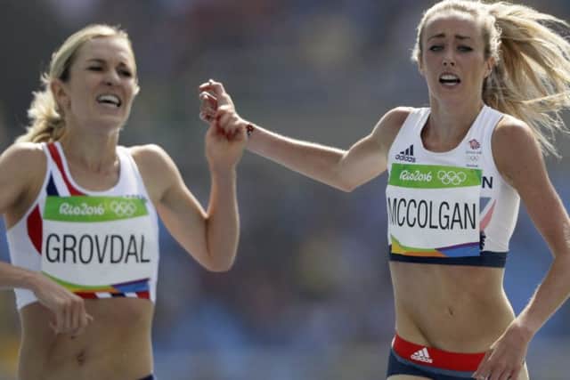 Eilish 
McColgan 
finishes her 
5000m heat yesterday alongside Norways Karoline Grovdal.Picture: David J. Phillip/Getty Images