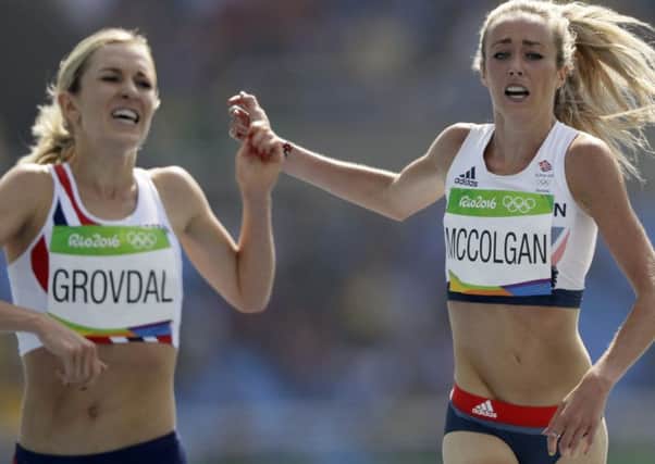 Eilish 
McColgan 
finishes her 
5000m heat yesterday alongside Norways Karoline Grovdal.Picture: David J. Phillip/Getty Images