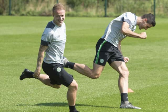 Leigh Griffiths, left, and Tom Rogic in training yesterday. Griffiths praised his manager for allowing players time off training to walk their children to their first day at school. Picture: SNS