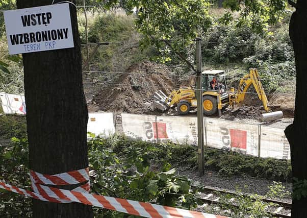 Heavy machinery begins the search to find a legendary Nazi train laden with treasure and armaments in Walbrzych, Poland. Picture: AP
