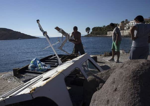A speedboat collided with a tourist vessel off the Greek island of Aegina near Athens, killing four people. Picture: AP
