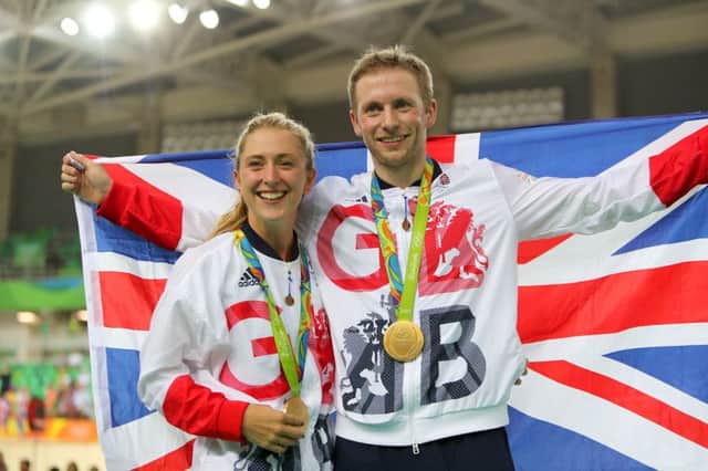 Laura Trott and fiance Jason Kenny celebrate a golden night in the Olympic velodrome. PICTURE: David Davies/PA Wire