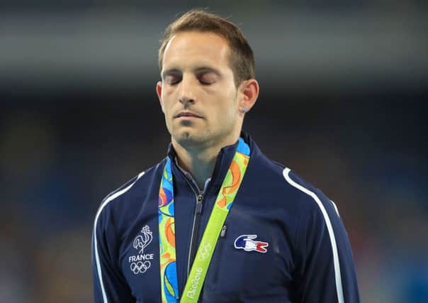 France's Renaud Lavillenie was visibly upset on the podium after being booed. PICTURE: PA