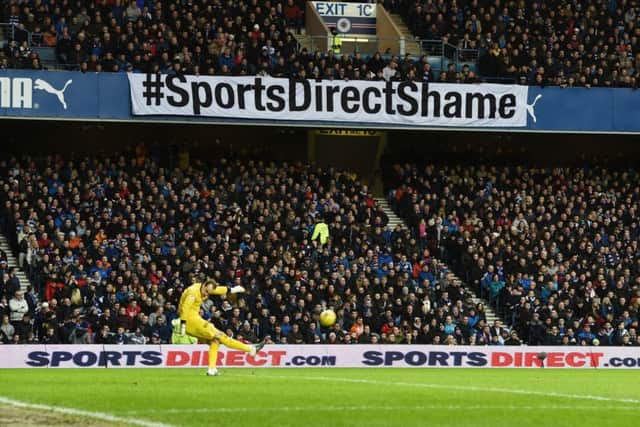 Rangers fans and the club board are unhappy with the current deal in place over Rangers Retail. Picture: SNS