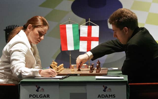 SOFIA, BULGARIA:  Michael Adams (R) of England plays against Judith Polgar (L) of Hungary during the seventh round of the M-Tel Masters Chess Tournament in Sofia, 18 May 2005.               AFP PHOTO / Dimitar DILKOFF  (Photo credit should read DIMITAR DILKOFF/AFP/Getty Images)