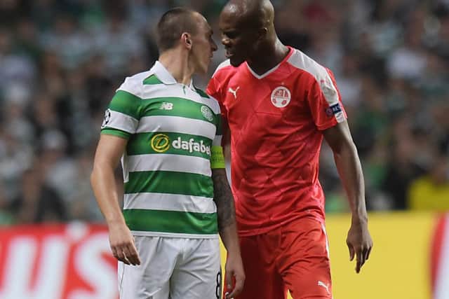 Celtic's Scott Brown confronts Hapoel's Anthony Nwakaeme. Picture: Craig Williamson/SNS