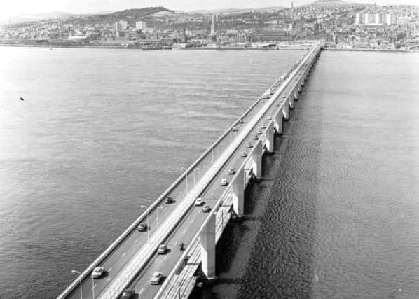 Traffic starts to flow across after the Queen Mother opens the bridge in August 1966. Picture: TSPL