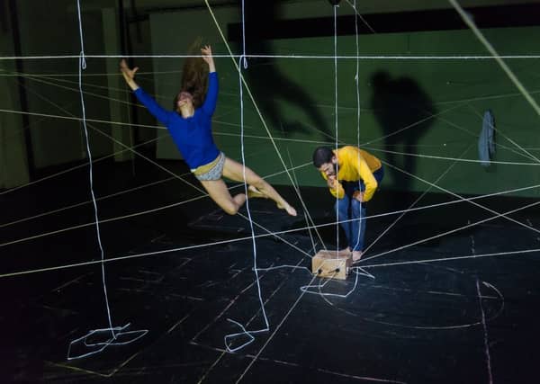 Gytha Parmentier and Roman Van Houtven play amoung the detonators