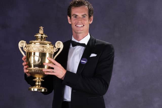 Andy Murray with the Wimbledon trophy. Picture: Getty
